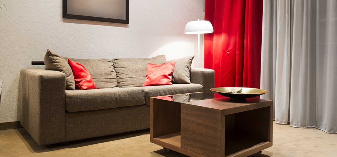 Living room with red curtains