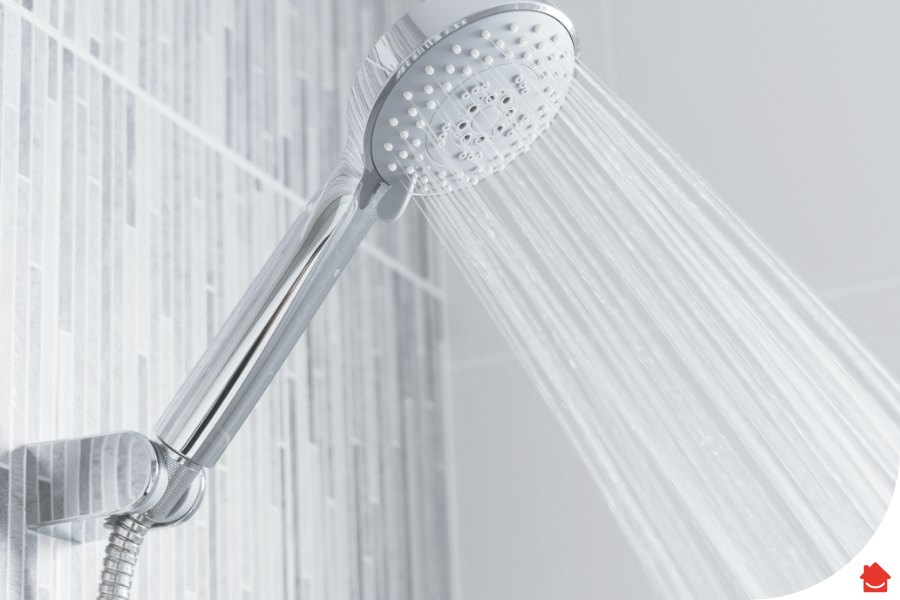 A running shower that has just been fixed from a leak.