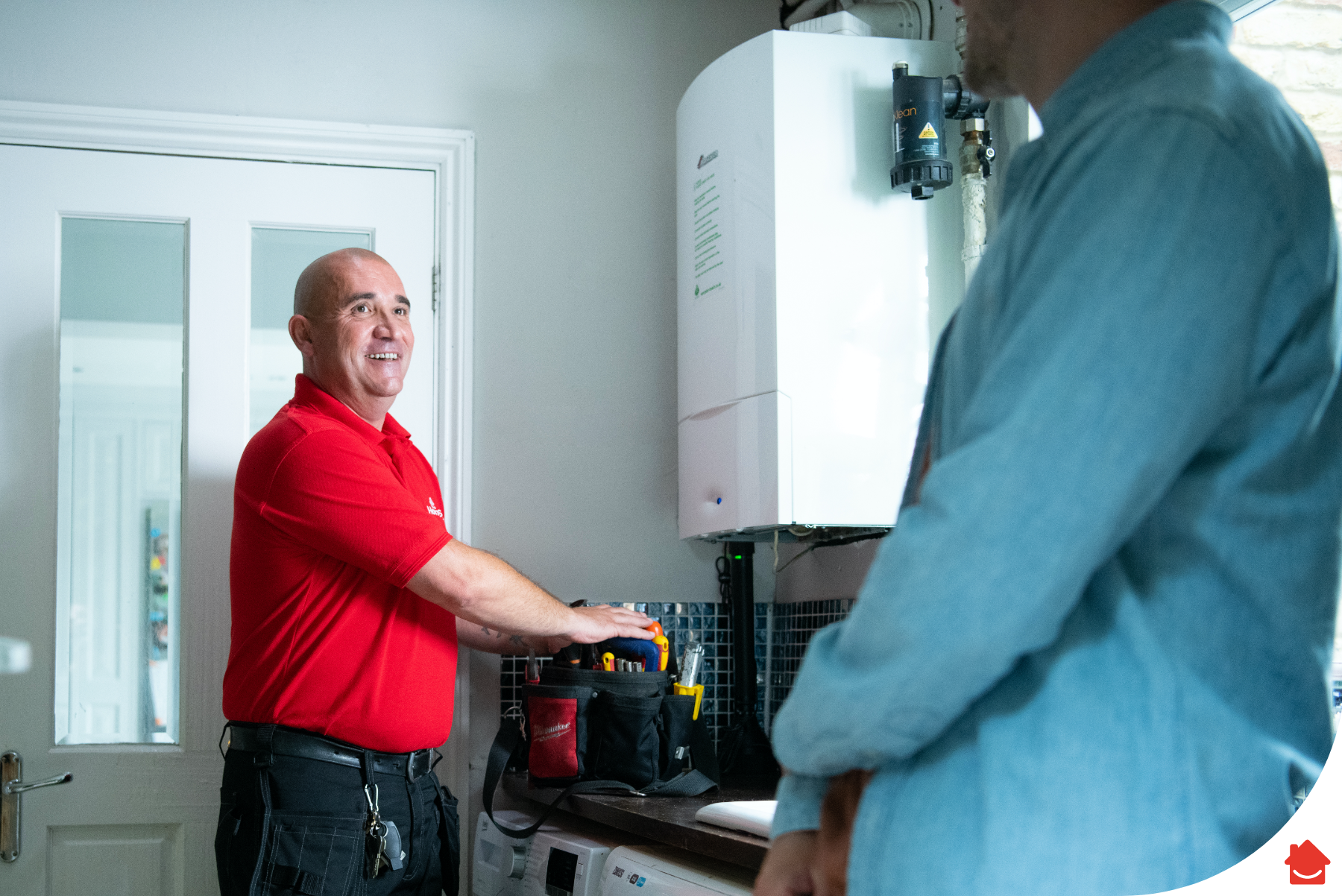 HomeServe engineer fixing a boiler - boiler maintenance