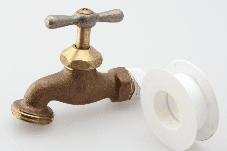 New tap with PTFE tape wrapped around the threads.