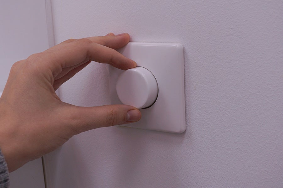 A white dimmer switch 