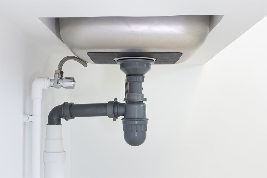 A P-trap underneath a sink