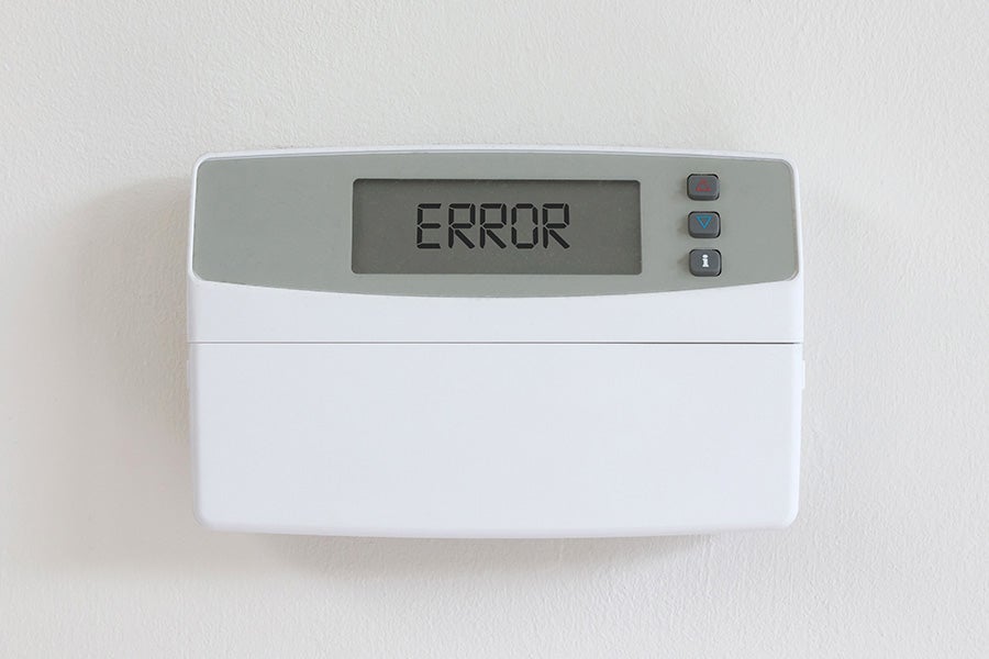 A thermostat not working and displaying and error message.