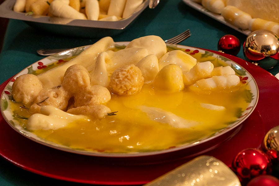 A Christmas dinner plate with the food substituted with fat and oil.