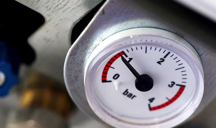 A boiler pressure indicator showing less than 1 bar.