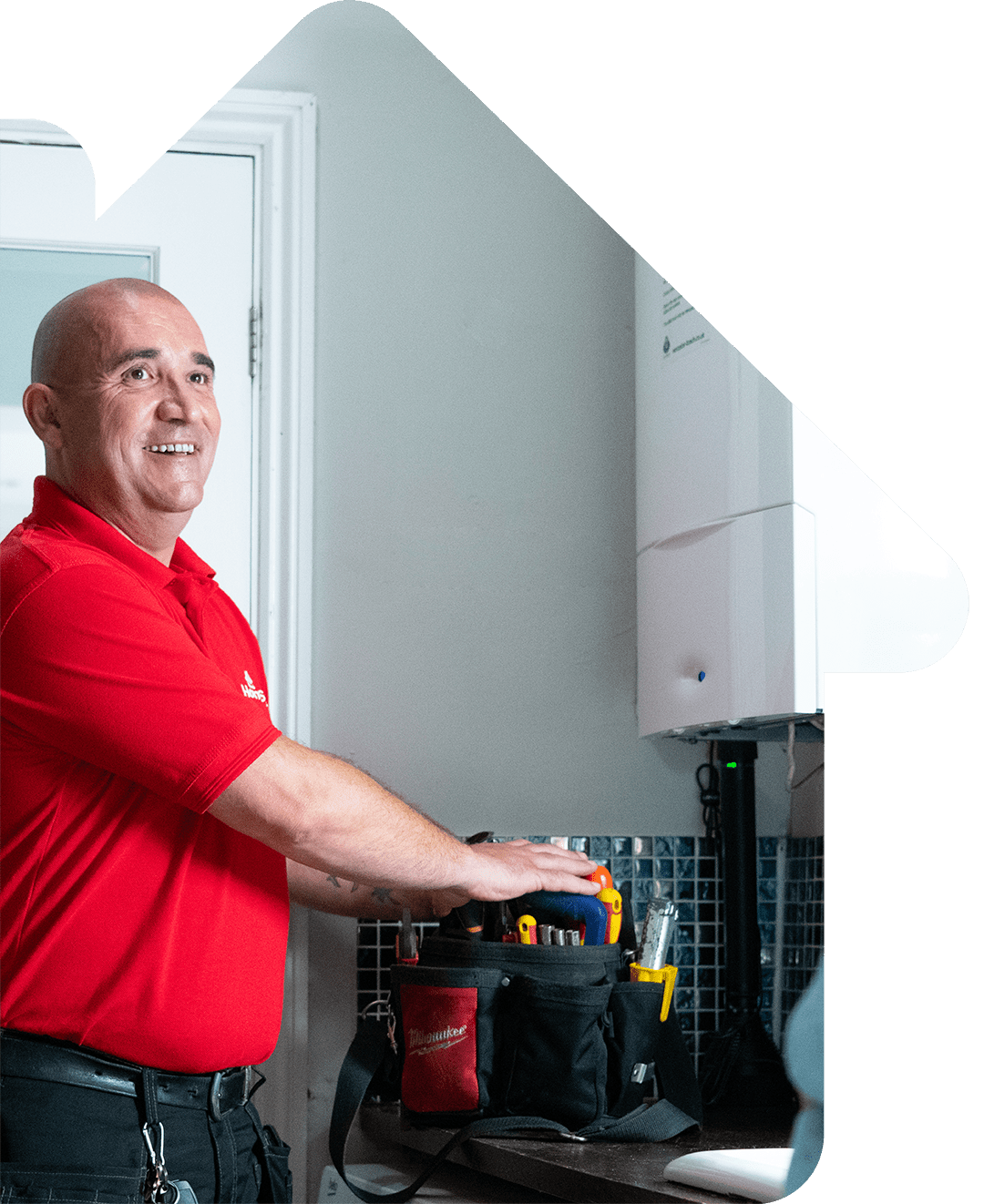 Engineer repairing a boiler
