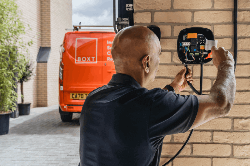 BOXT engineer installing an at home EV charger