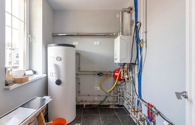 Unvented hot water cylinder inside property