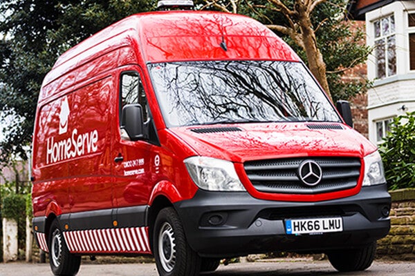 HomeServe van parked outside a house