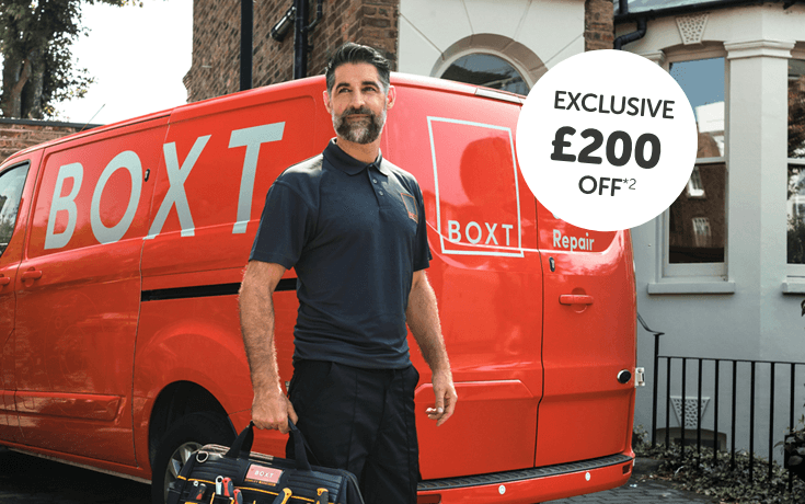 Engineer standing next to BOXT van and roundel with exclusive £200 off